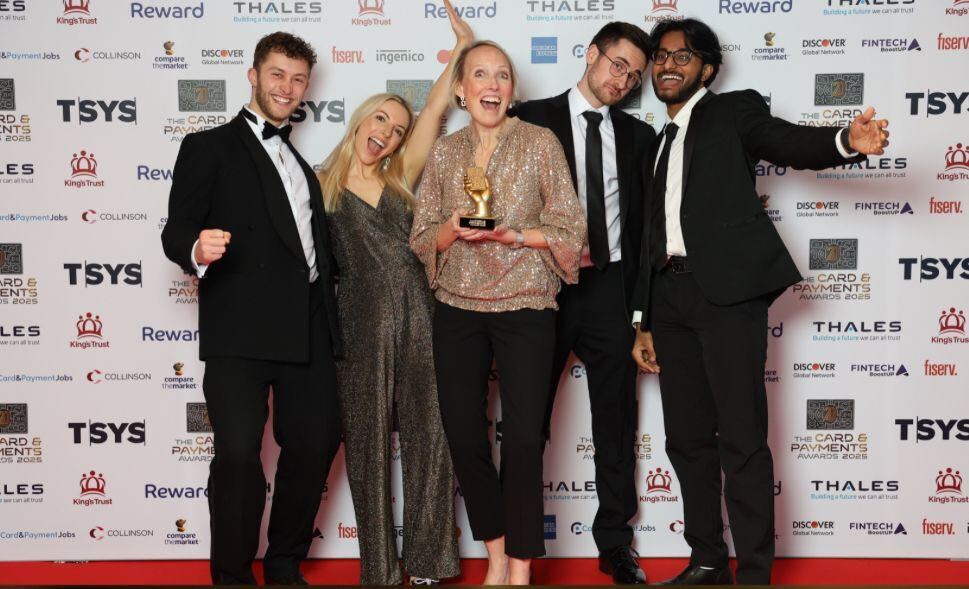 Photo of yaspa team members at an event with an award