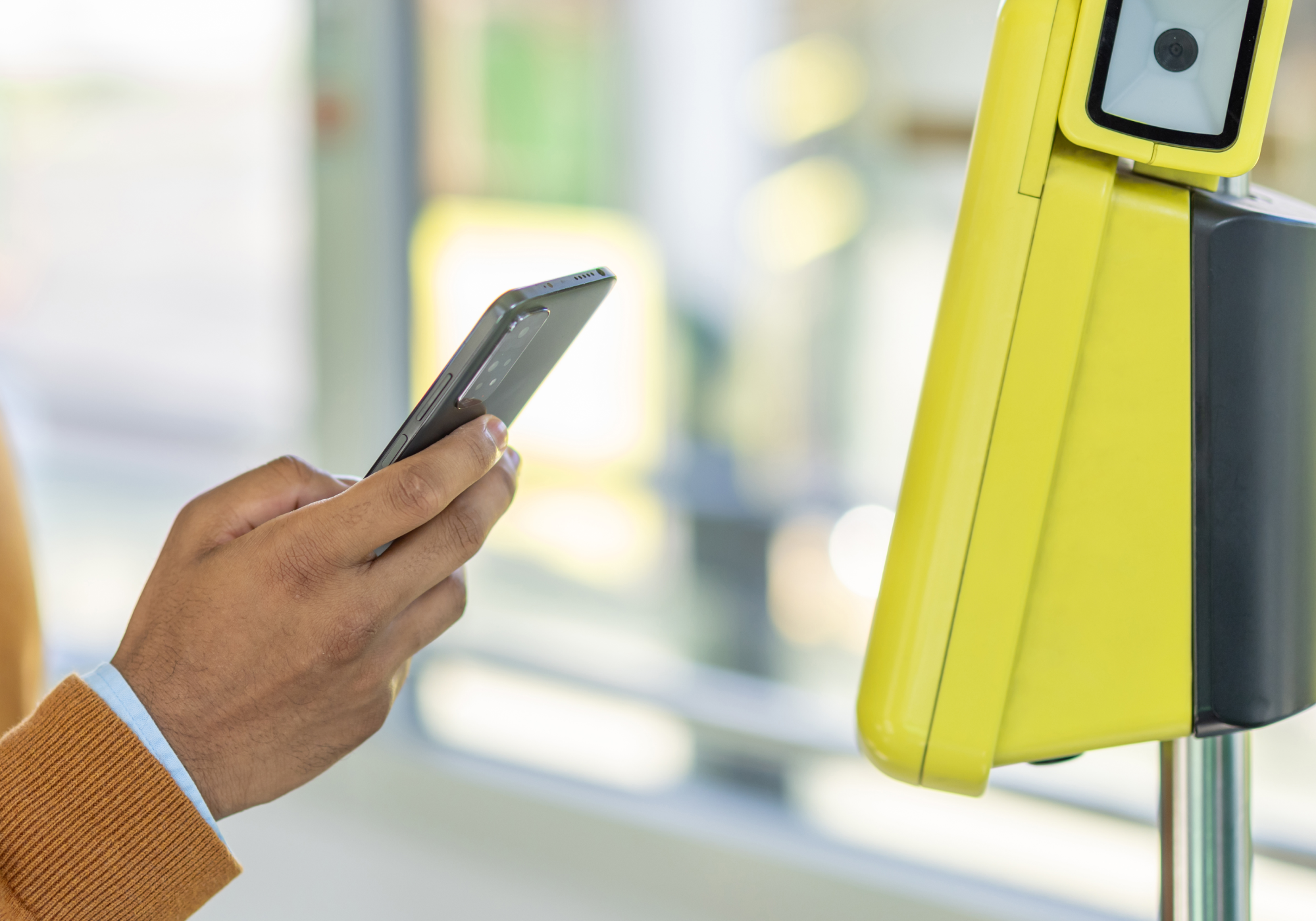 a phone by a card reader machine